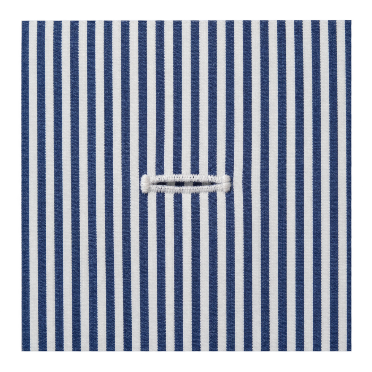Neatly stitched horizontal final buttonhole across vertical navy and white shirt stripes
